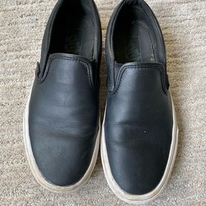 Black slip-on Vans
